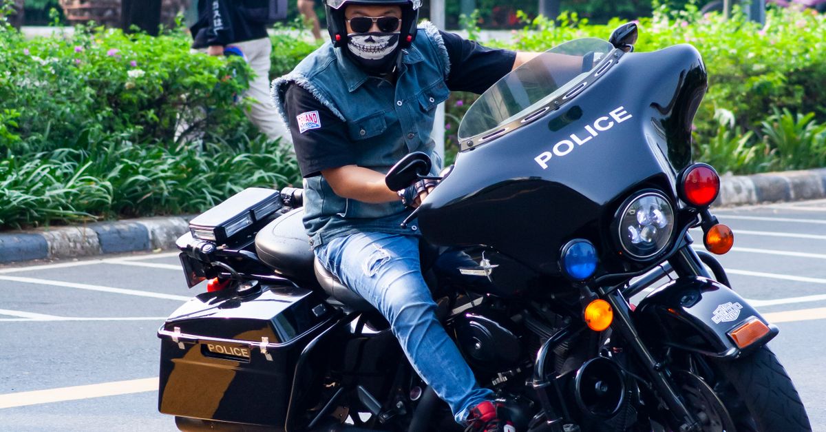 Police Officer Riding Harley Davidson Motorcycle · Free Stock Photo