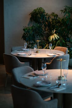 Luxurious dining setting in a Tokyo restaurant with elegant decor and ambient lighting.