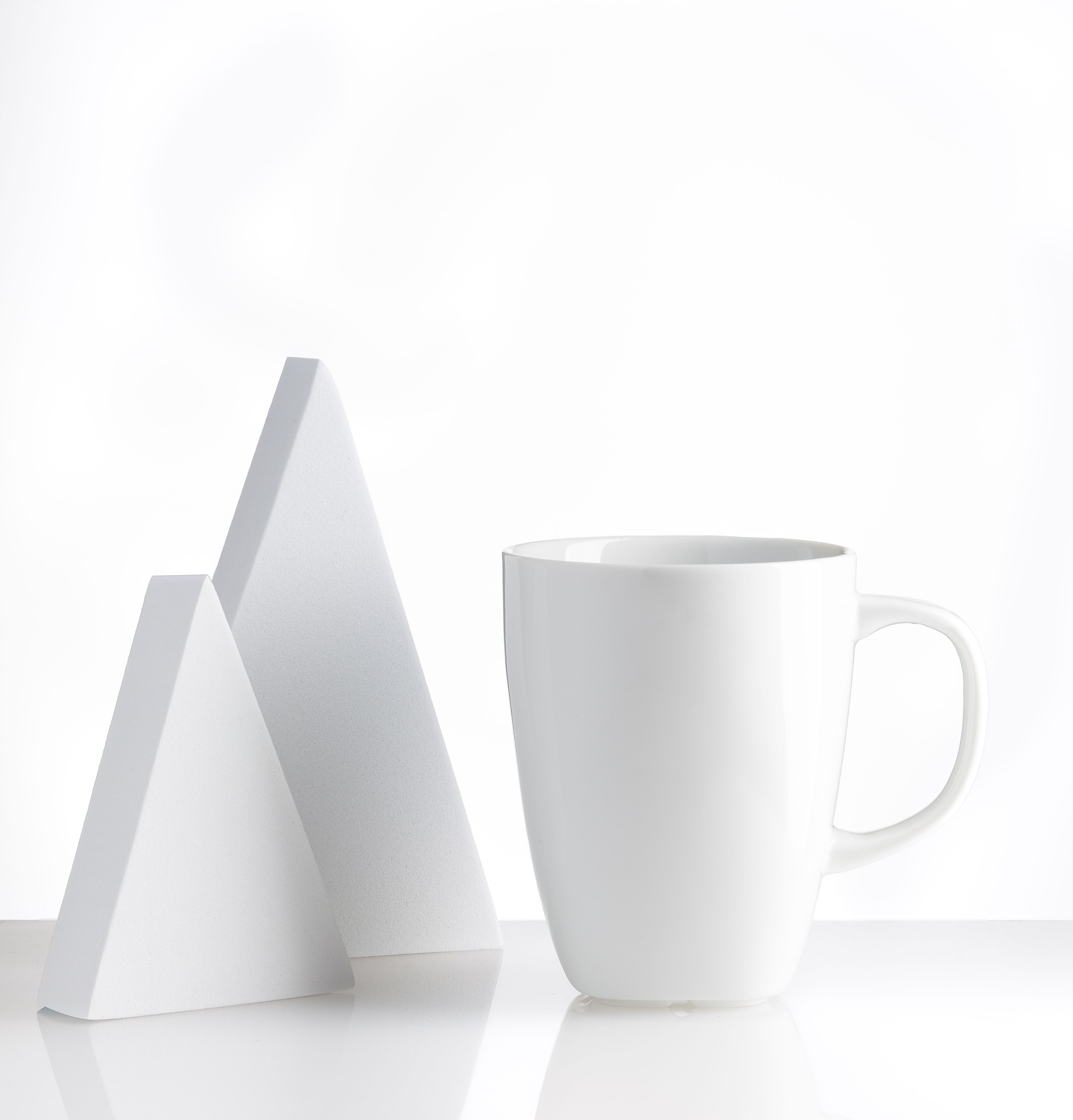Minimalist White Mug and Abstract Geometric Shapes · Free Stock Photo