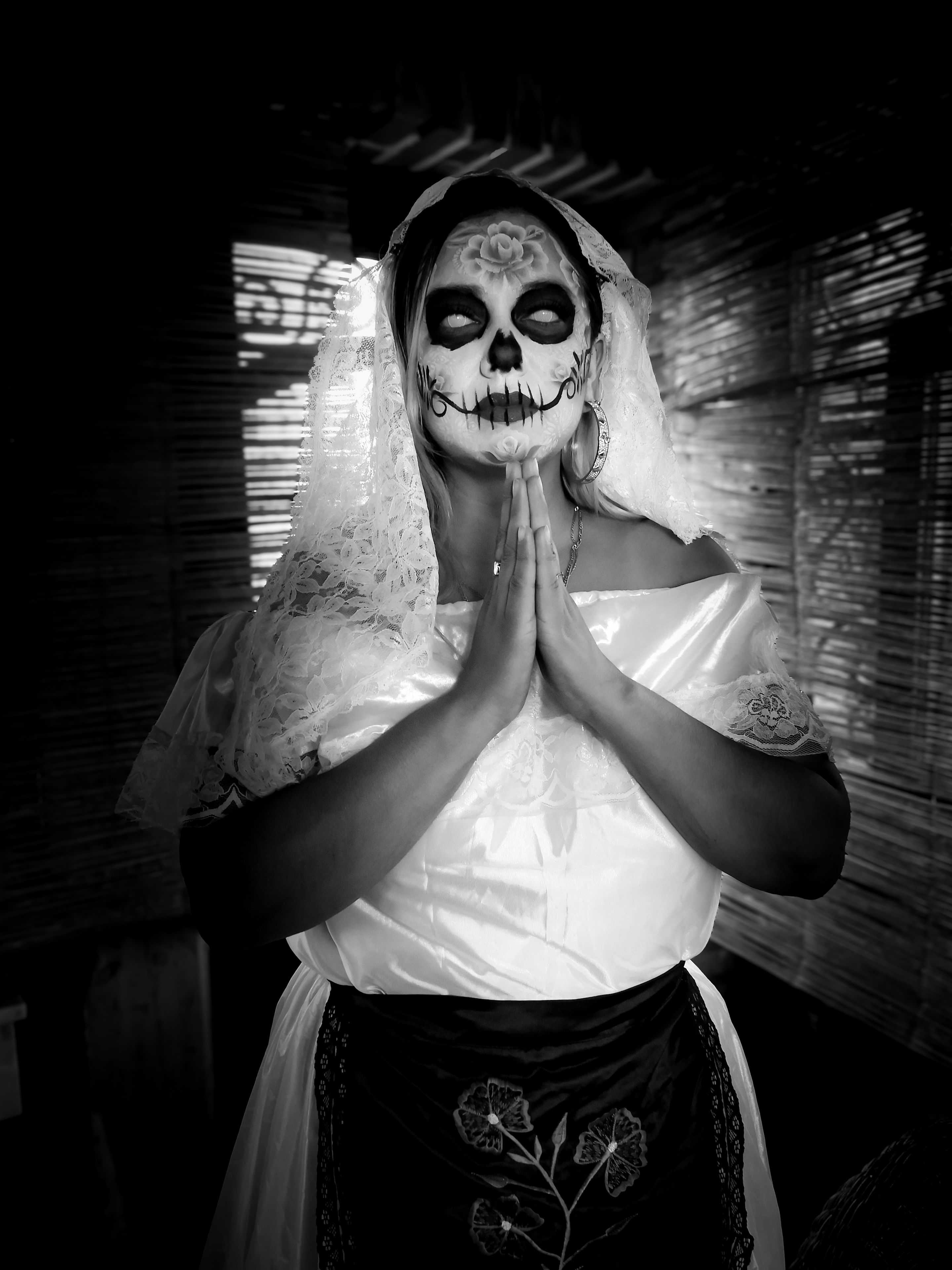 Black and white portrait of a Catrina, a symbolic figure in Day of the Dead celebrations in Mexico.