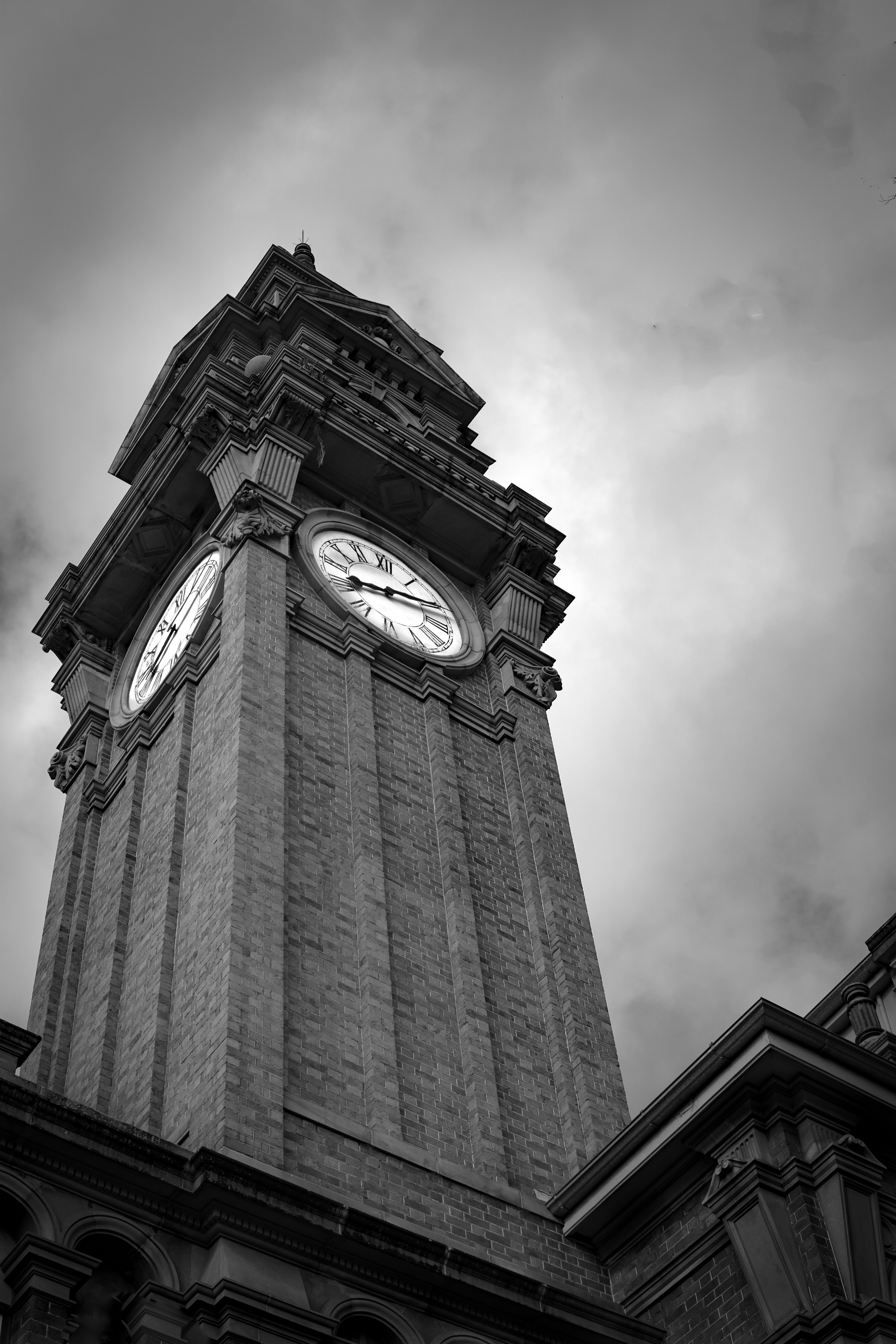 Dramatic Black and White Clock Tower Architecture · Free Stock Photo