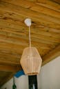 Rustic Wooden Ceiling with Hanging Lamp