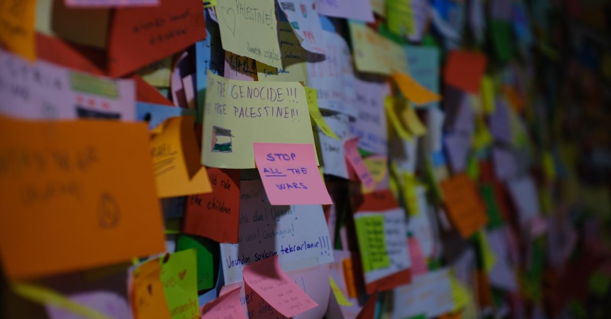 Post Or Message Colorful Post-it Note Wall with Messages of Protest · Free Stock Photo