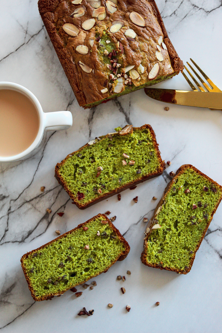 Freshly baked pistachio bread with almond slices on a marble table, Atlanta, Georgia.