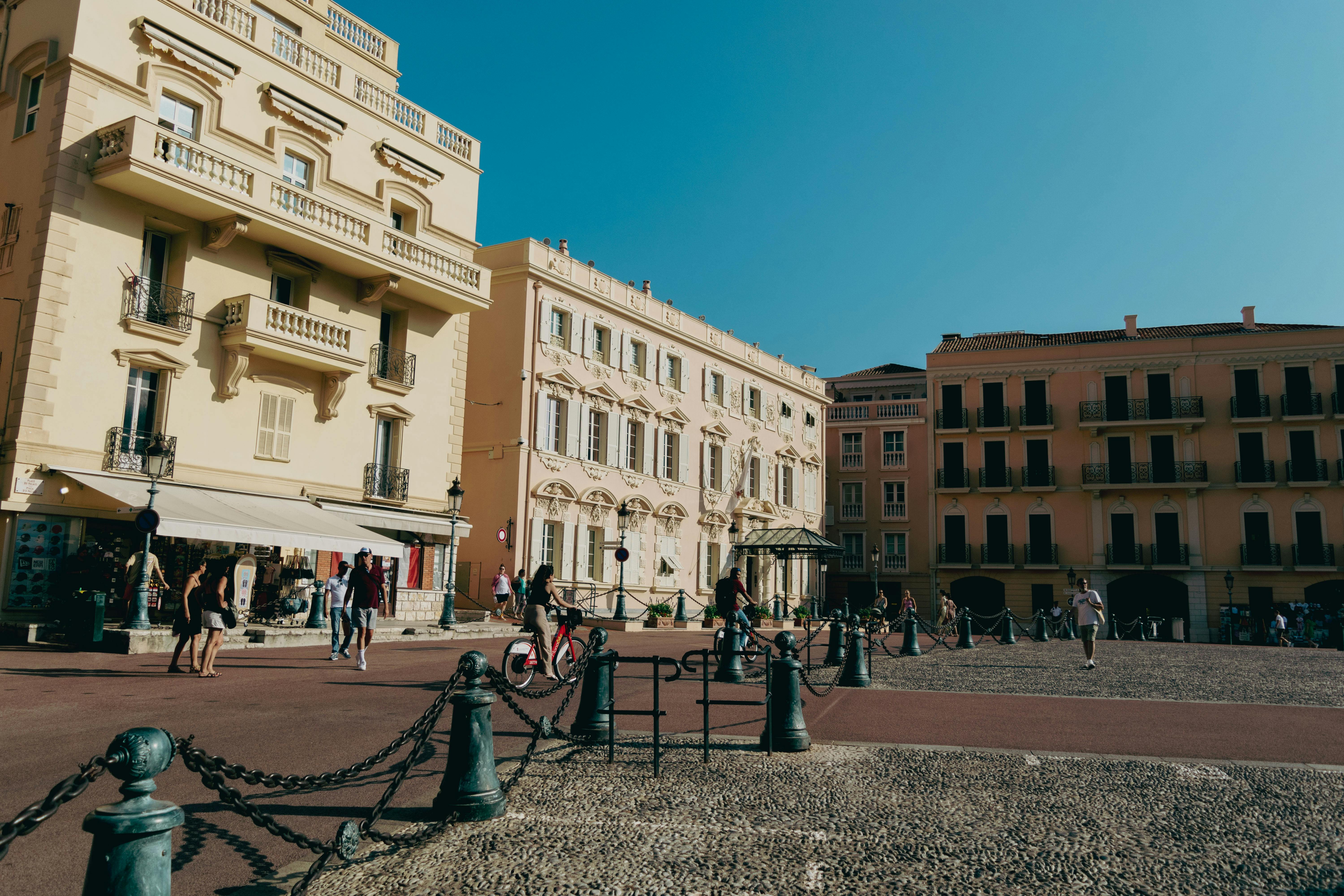 Explore Monaco's historic architecture under the bright summer sun.