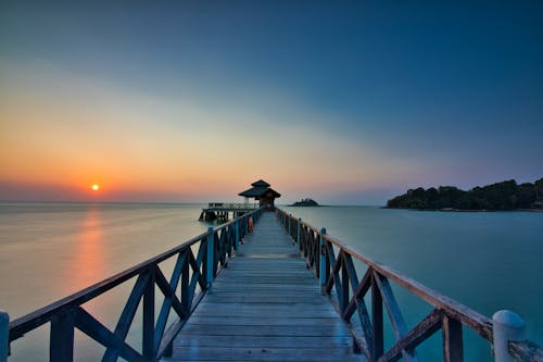 Scenic Photo Of Wooden Dock During Dawn 