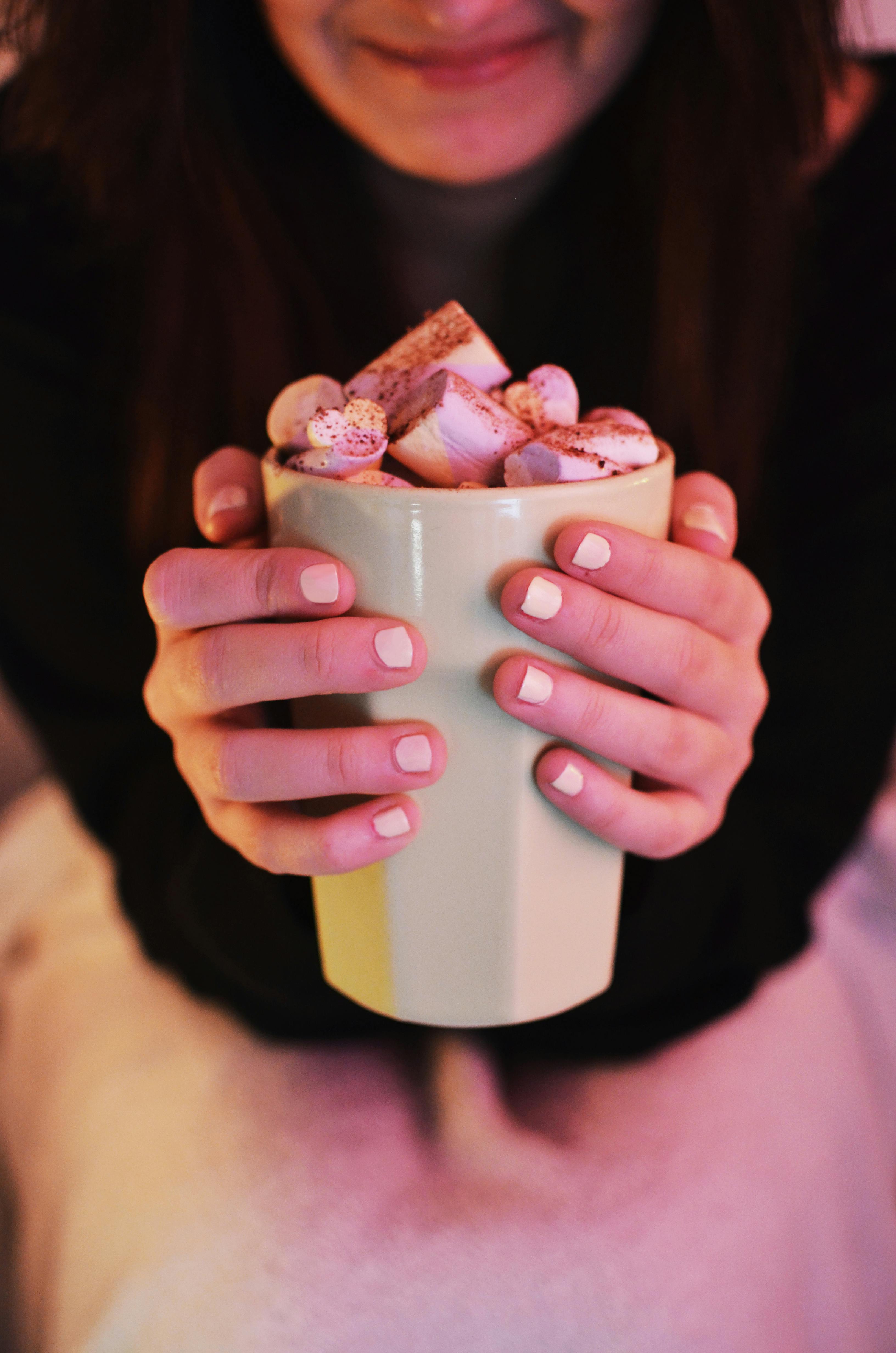 Woman Holding Gray Cup