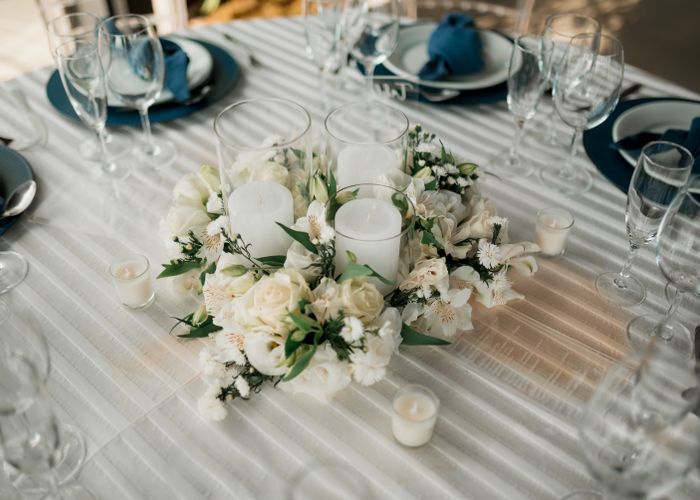 White floral centrepiece with candles