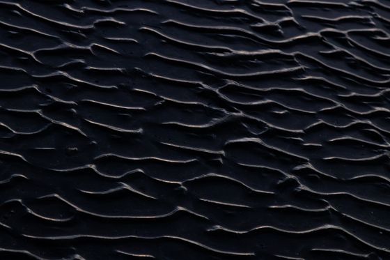 Dark sand ripples by Diego Fraga on Pexels