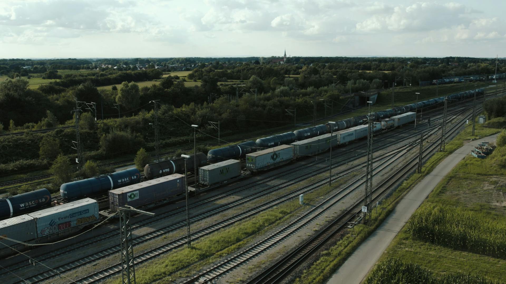 Freight train on railways in Offenburg, capturing logistics and transport in rural Germany.