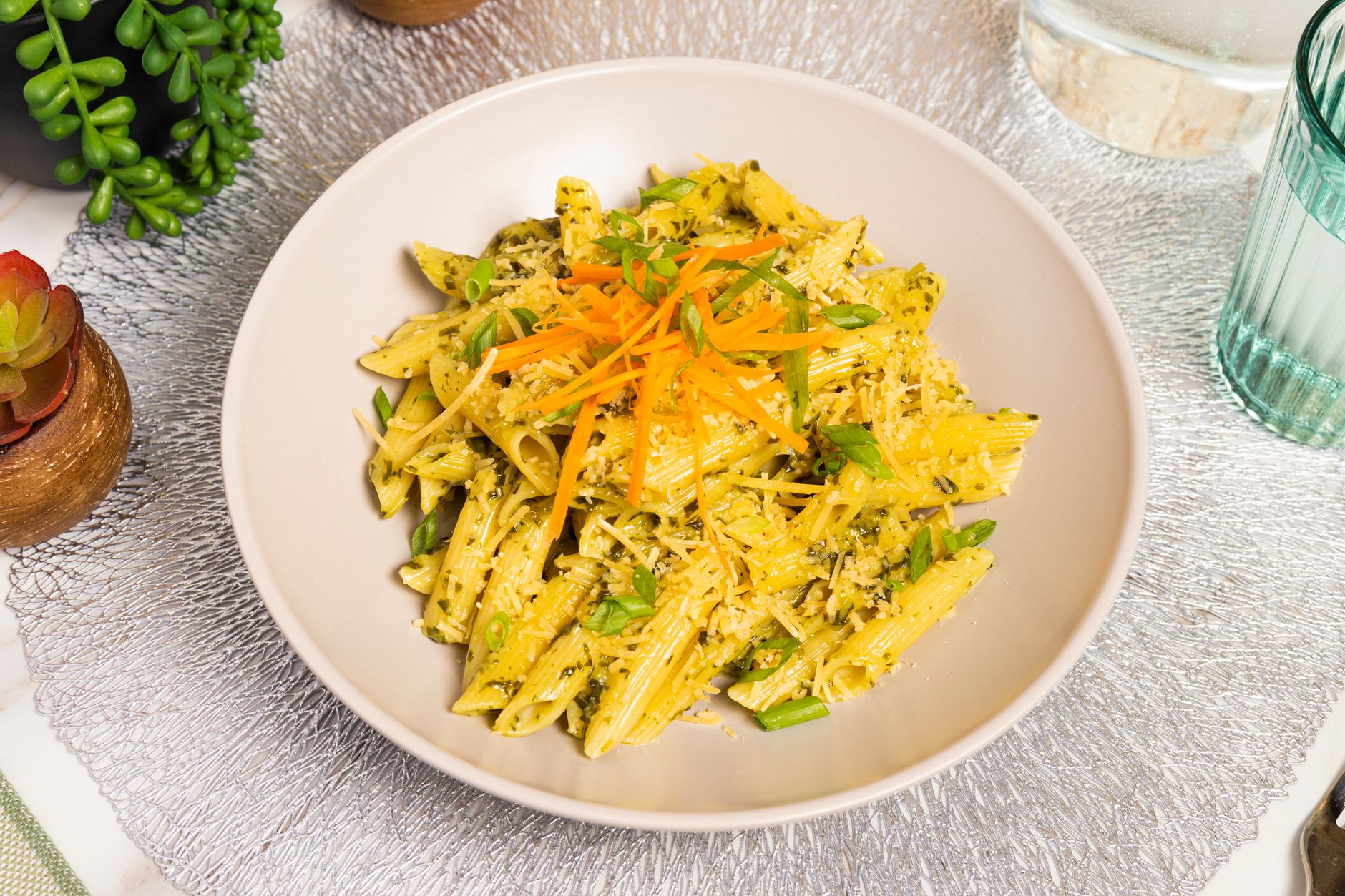 Carrot top pesto blending process in food processor