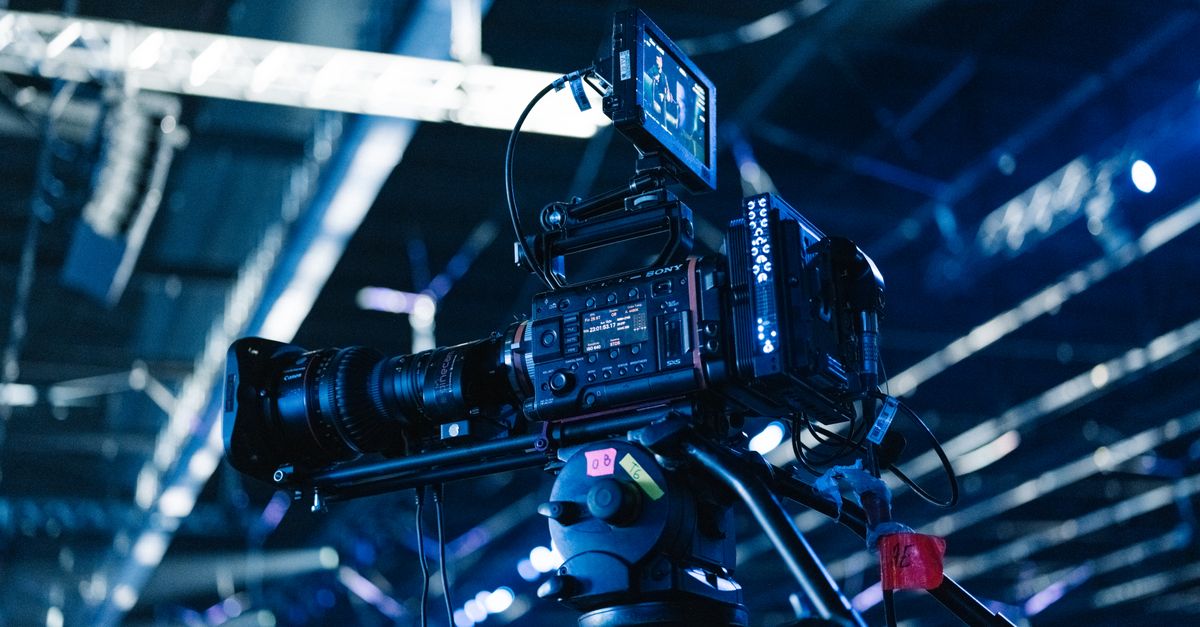 Professional Video Camera Setup at Indoor Event · Free Stock Photo