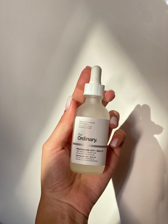 Close-up of premium cosmetic packaging illustrating tactile brand design
