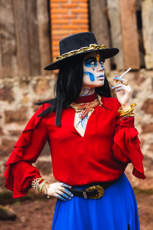 Free A vibrant La Catrina in traditional costume celebrates Día de Muertos in Mexico City. Stock Photo