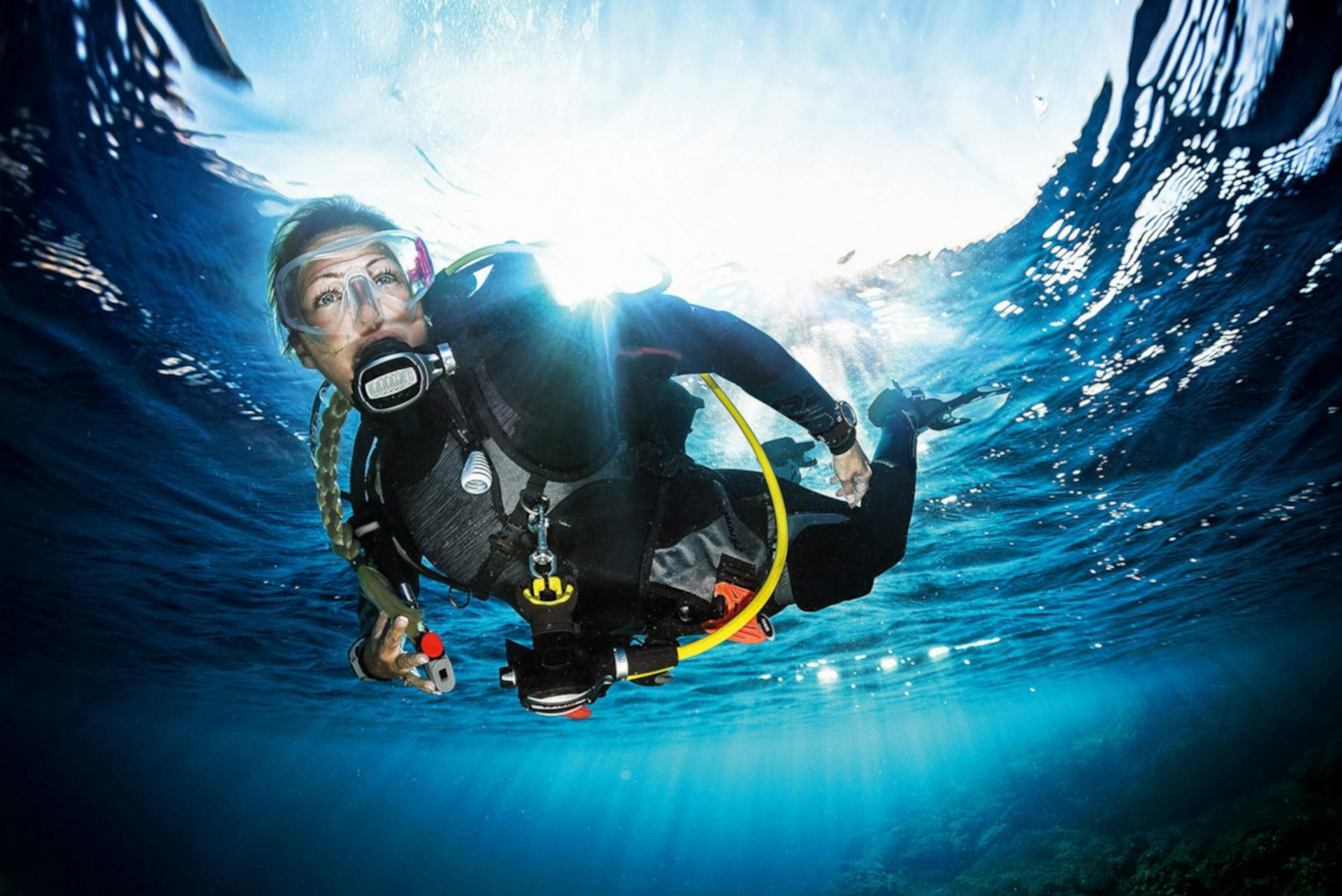 Underwater Diver in Vibrant Ocean Setting