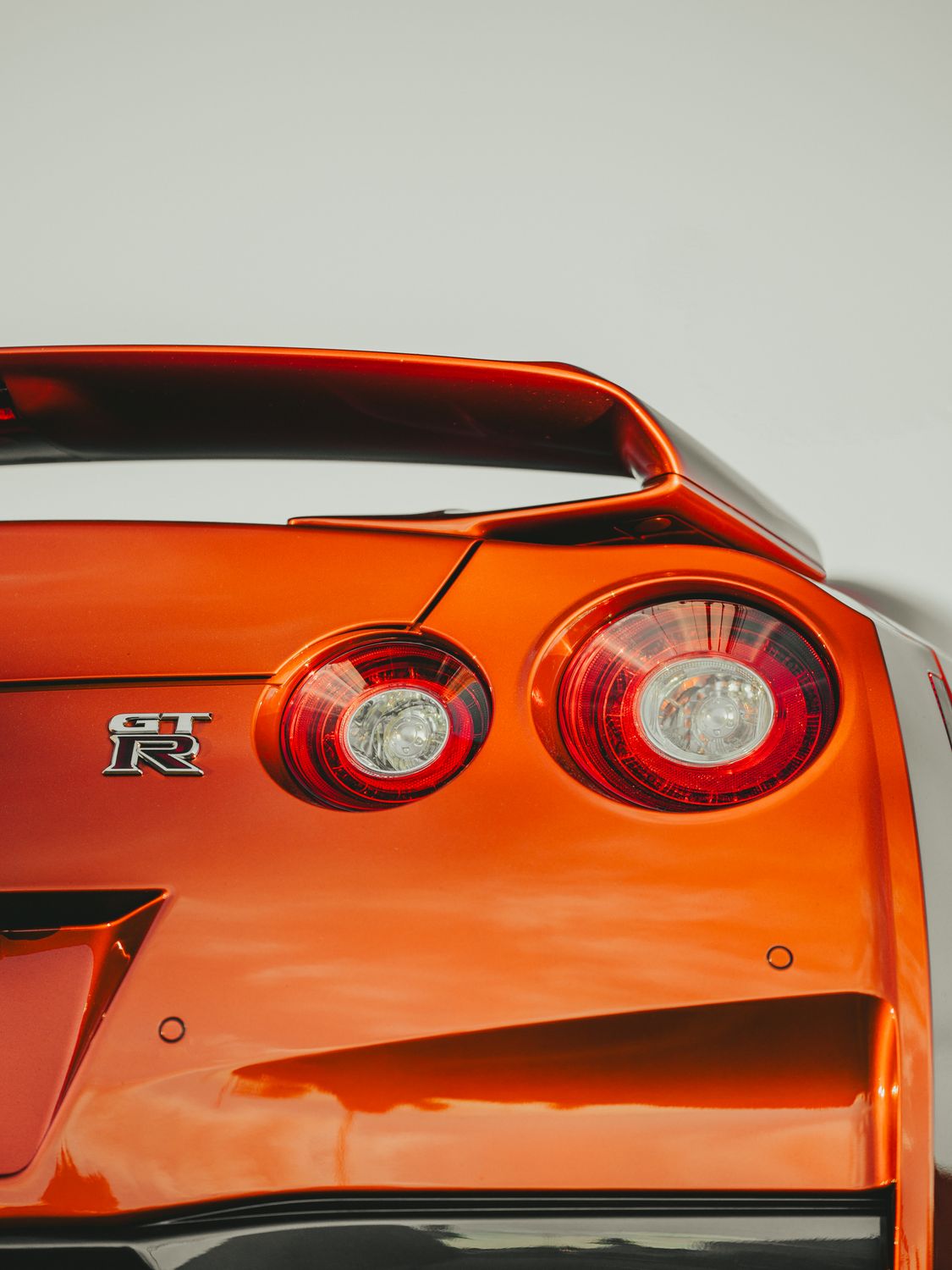 Close-Up of Nissan GT-R R35 Rear in Bright Light · Free Stock Photo