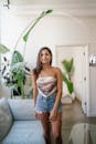 Woman Standing Near Sofa