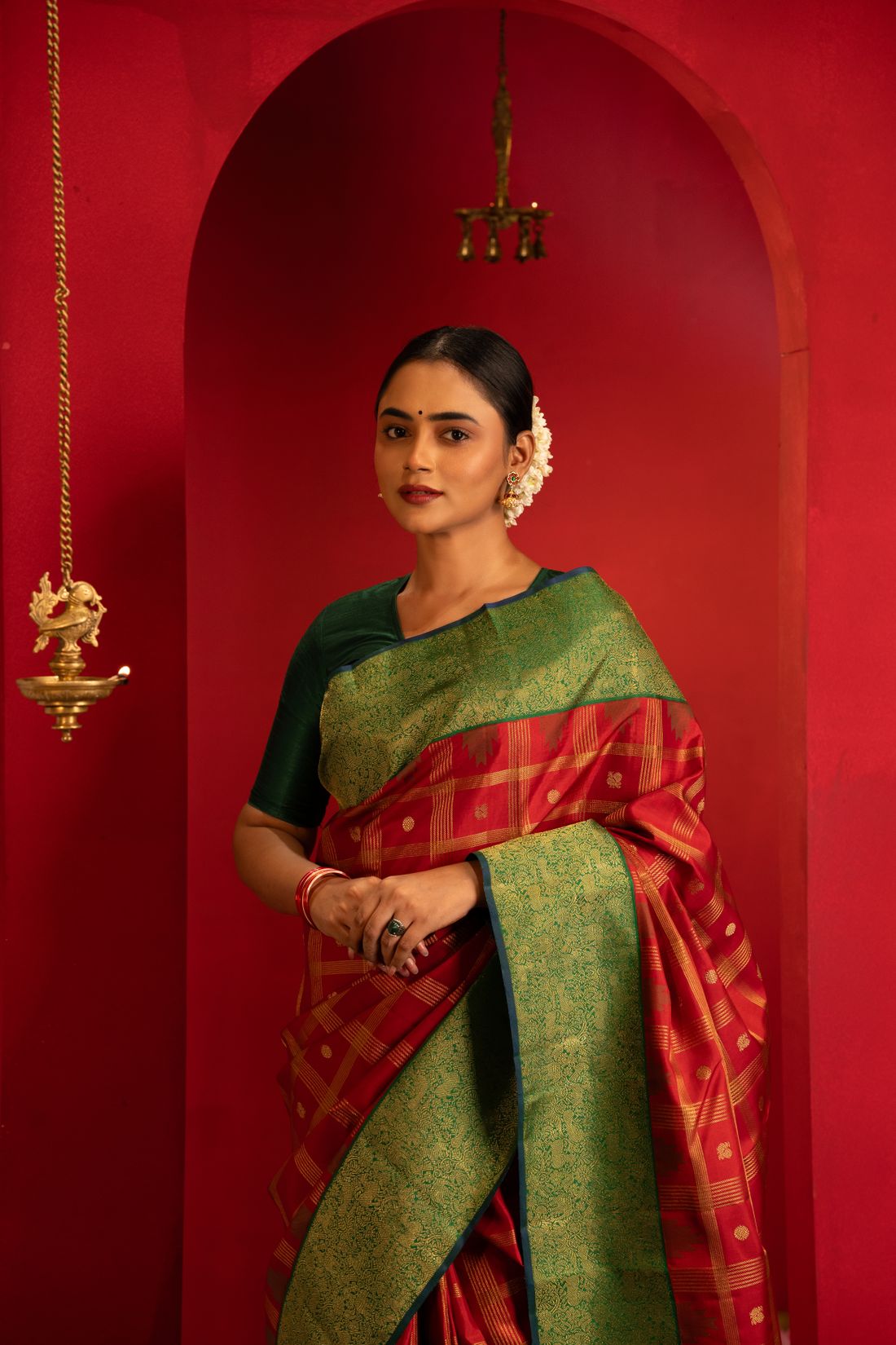 Indian woman in a beautifully styled traditional saree