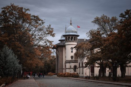 Free Stunning view of historic Ottoman building surrounded by autumn trees. Stock Photo