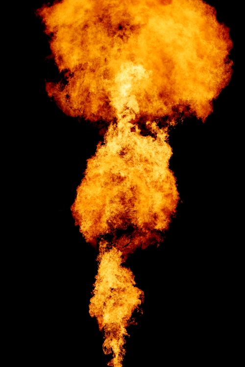 Vibrant Explosion of Fire Against Black Background · Free Stock Photo