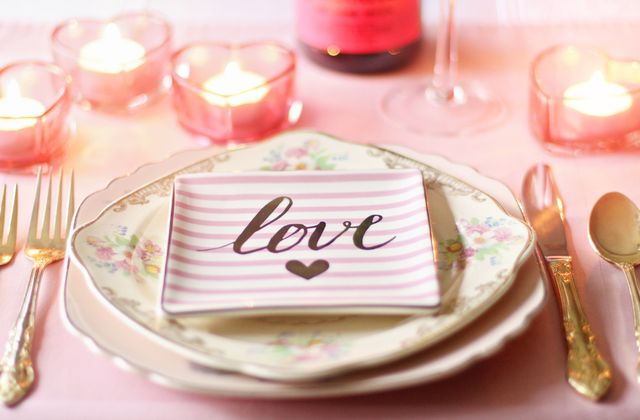 A candlelit table set for a small celebration