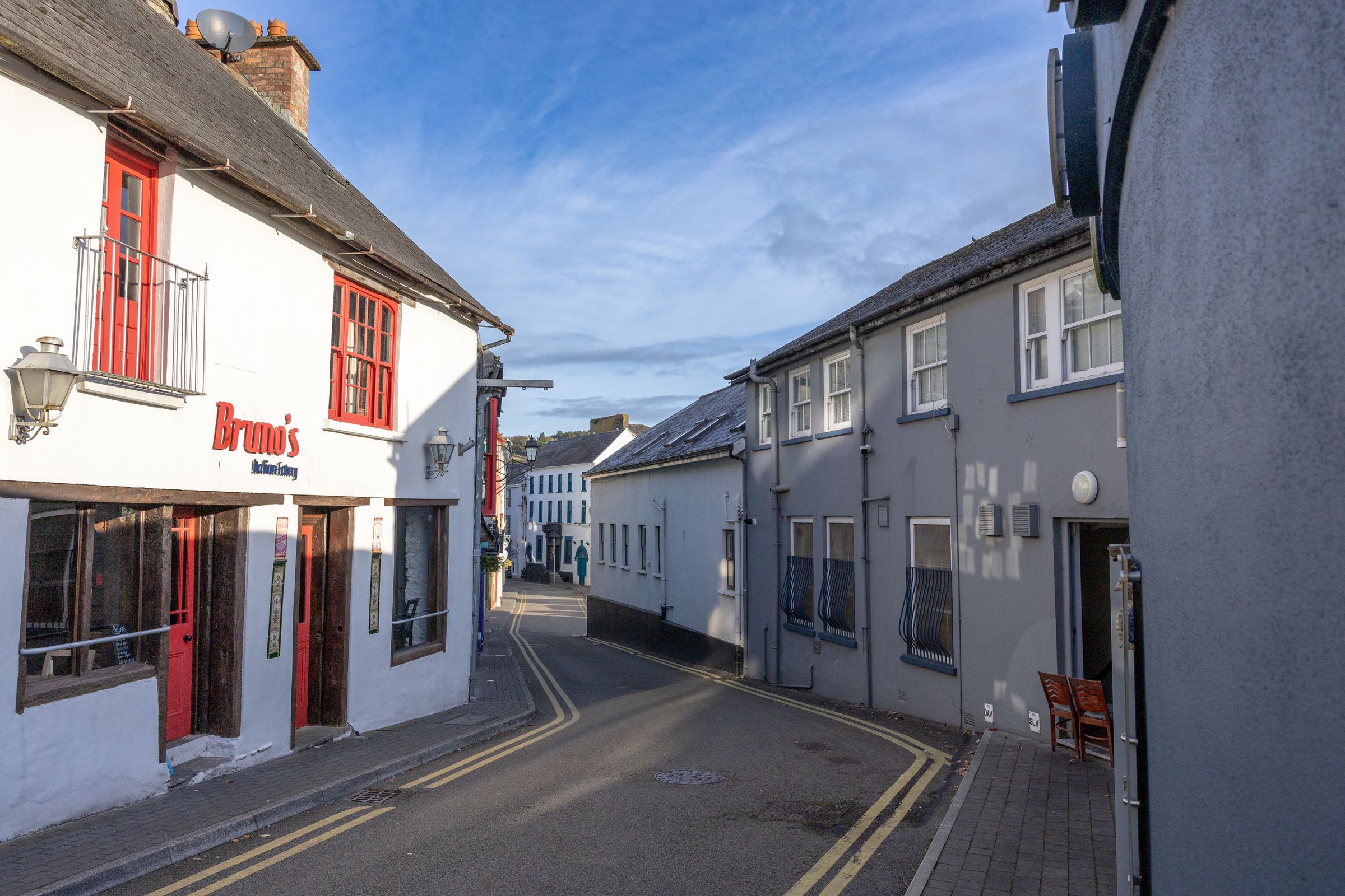 A street view in Kinsale, County Cork, Ireland, showcasing traditional architecture