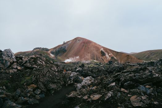 Capture of the stunning geothermal and rocky terrain in Iceland's Landmannalaugar region.