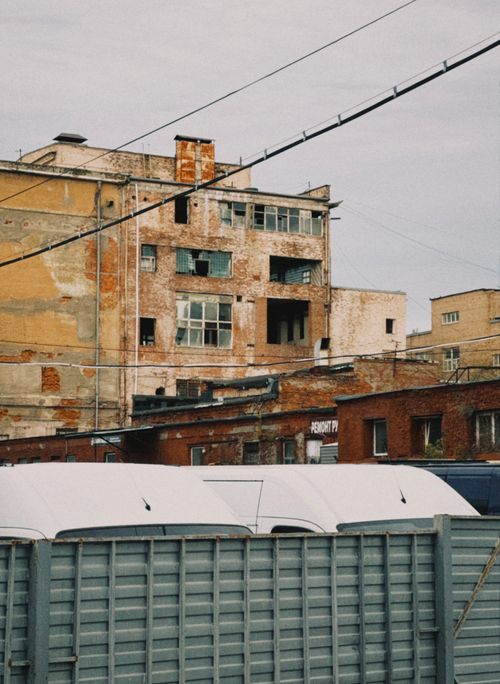 Free Old brick buildings showcasing urban decay in industrial area. Stock Photo