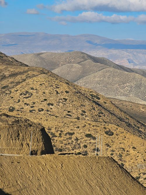 Free Breathtaking view of the rugged Mustang mountain terrain with clear blue skies. Stock Photo
