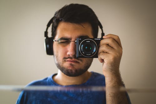 Free stock photo of dslr, headphone, mirror