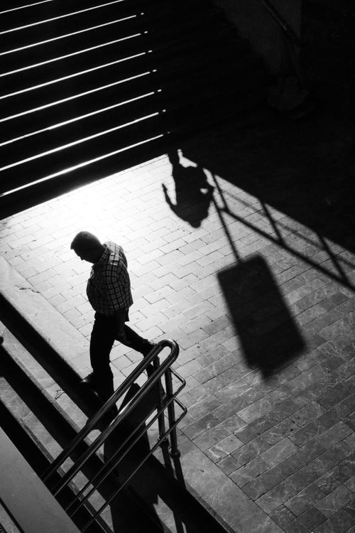 Free Dramatic black and white silhouette of a man walking downstairs with shadows, Istanbul. Stock Photo