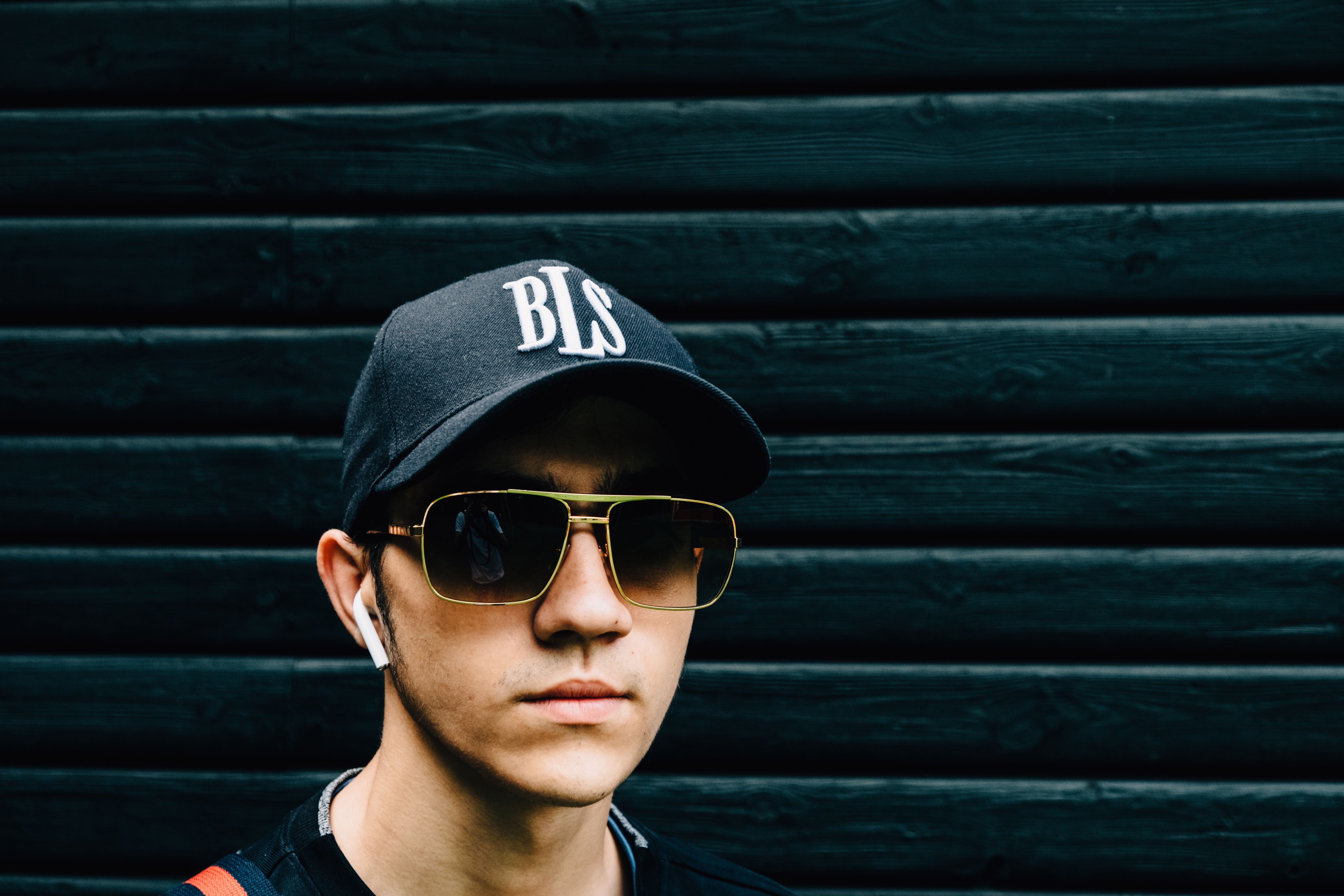 Close Up Photo of a Man Wearing Sunglasses · Free Stock Photo