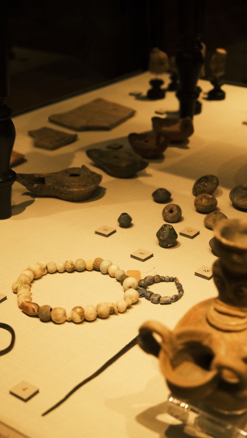 Ancient Artifacts Displayed in Museum Exhibit · Free Stock Photo