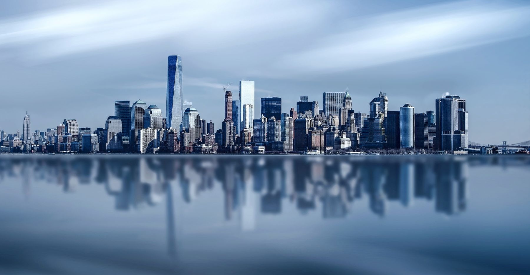City skyline across calm water