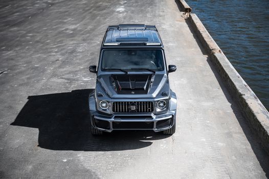 High-performance luxury SUV on urban waterfront