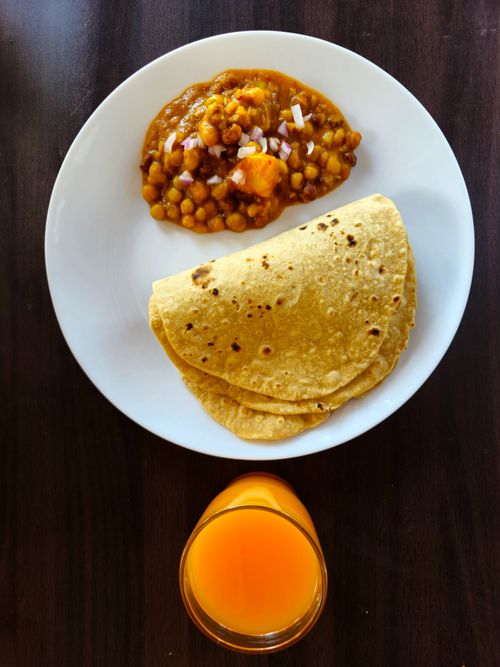 Fried bara with curried channa