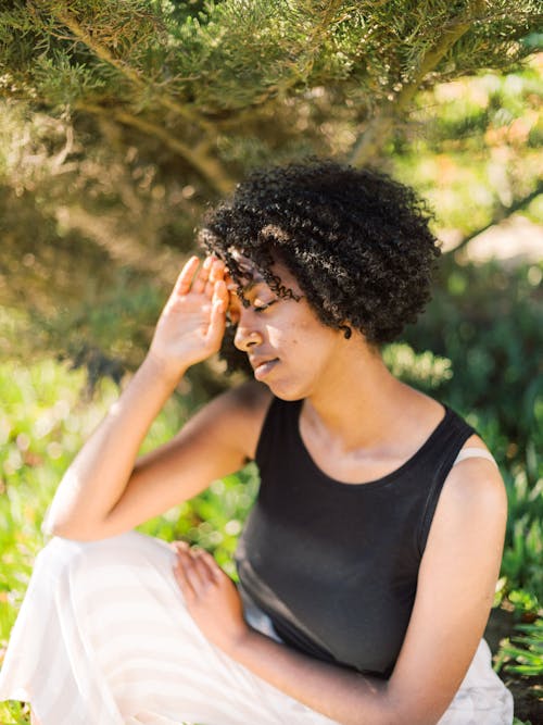 Photo Of Woman Touching Her Head