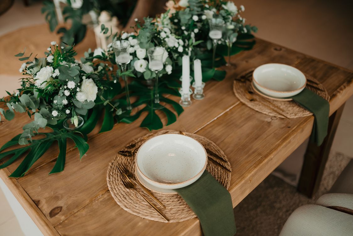 Elegant Rustic Table Setting with Greenery Decor · Free Stock Photo