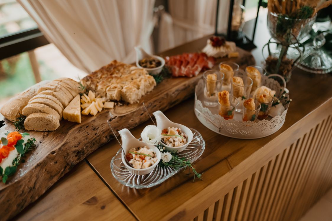 Rustic Buffet Layout Rustic Buffet Display with Assorted Appetizers · Free Stock Photo