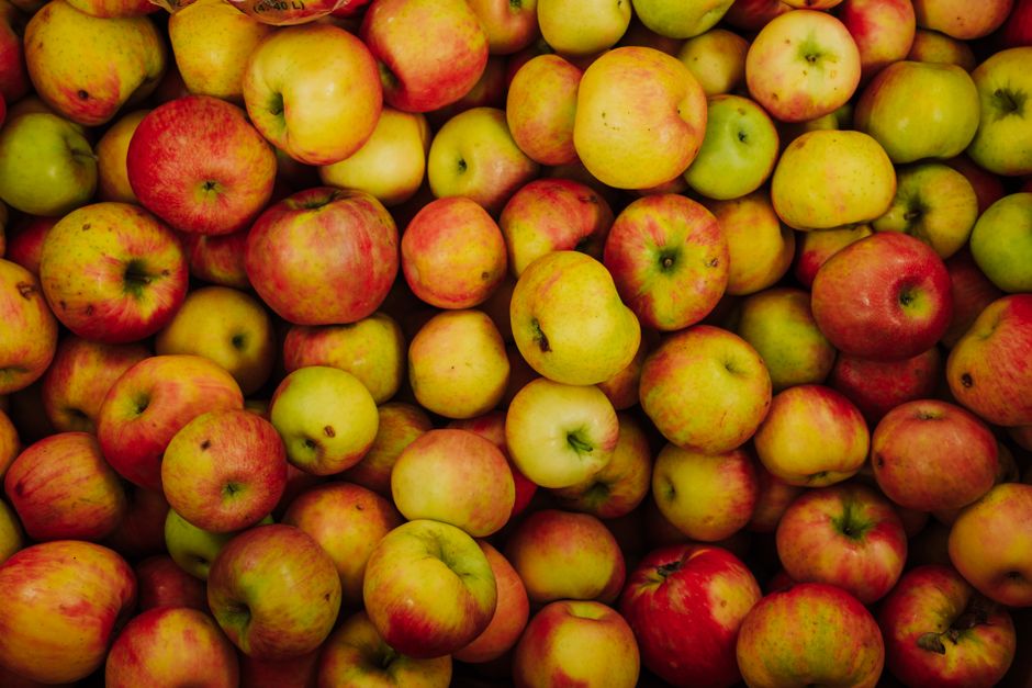 A vibrant collection of red and green apples showcasing autumn's bounty.