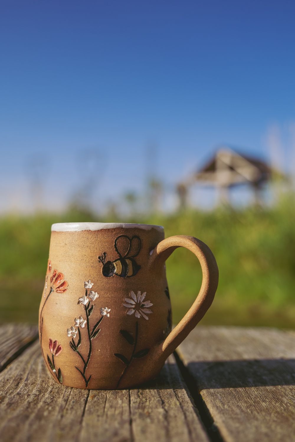 Handcrafted Ceramic Mug with Floral Design · Free Stock Photo
