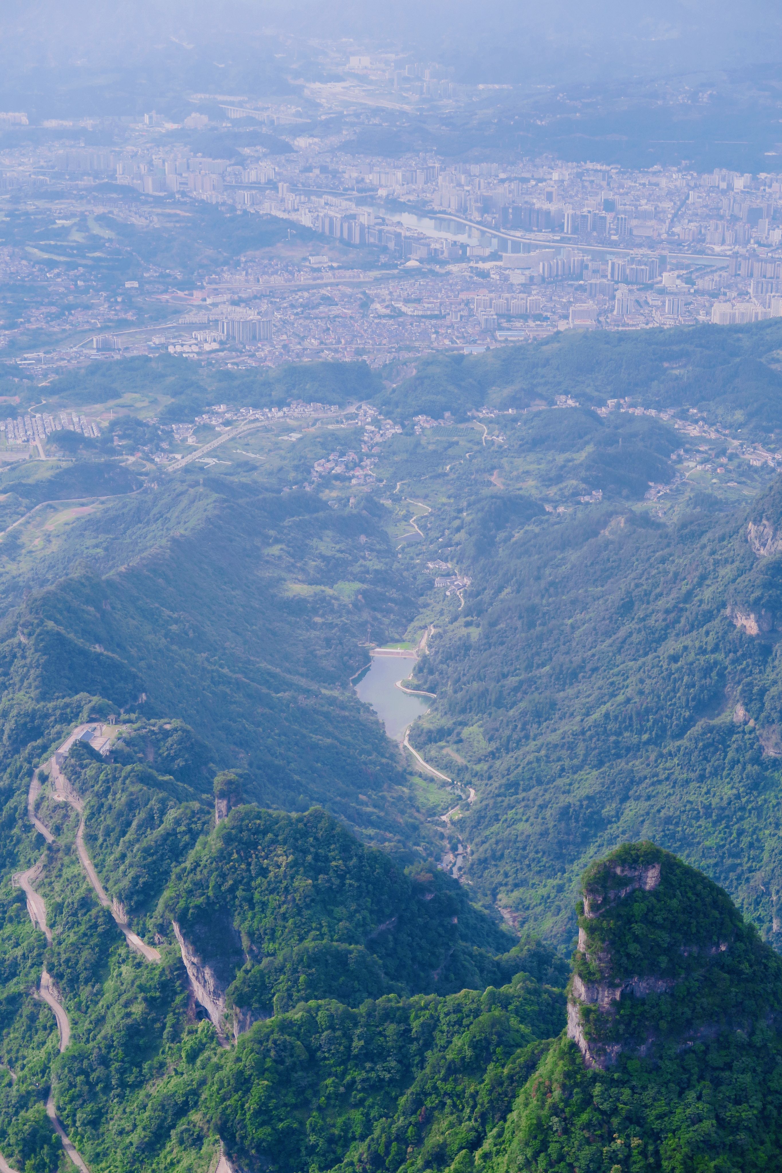 Aerial View of Mountain Valley and Cityscape · Free Stock Photo