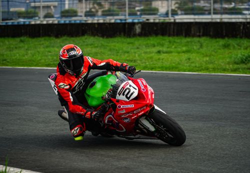 Free Racing on a motorcycle track in Mabalacat, Central Luzon, Philippines. Dynamic motion captured. Stock Photo