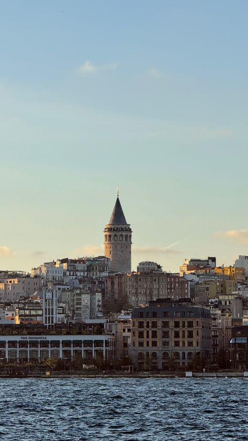 Free Scenic view of Galata Tower amidst Istanbul's urban landscape during daytime. Stock Photo