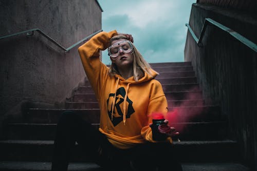 Photo Of Woman Sitting On Stairs