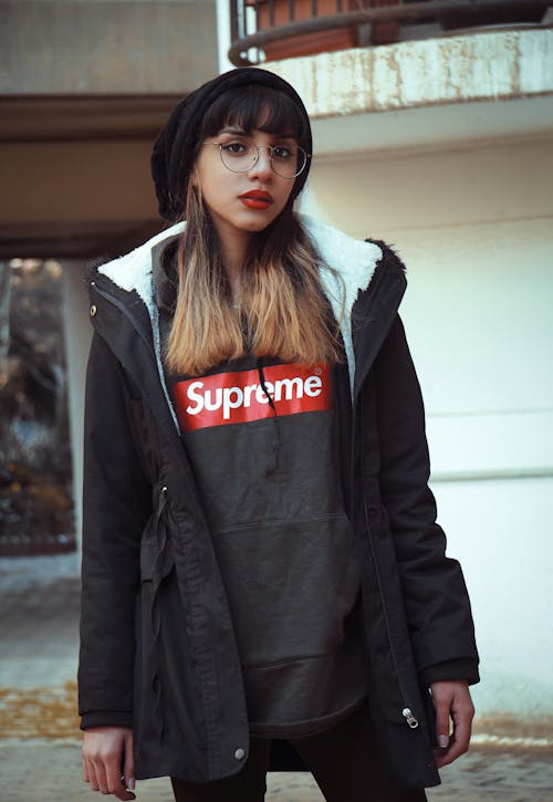 Photo Of Woman Wearing Supreme Shirt