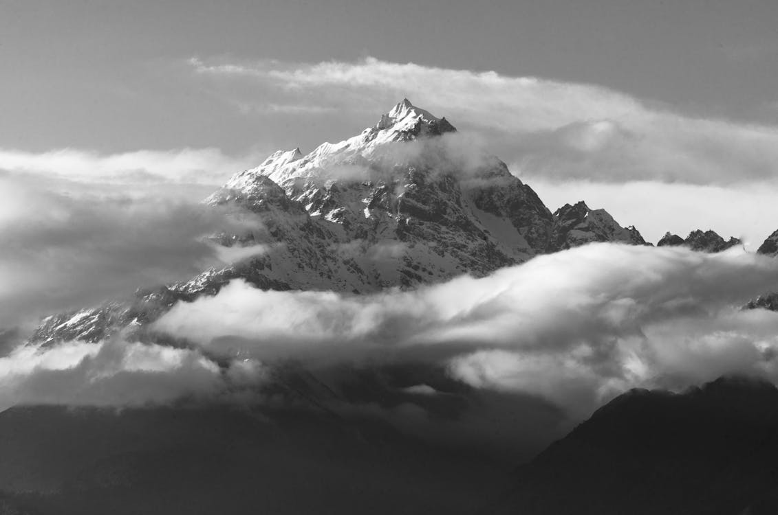 Monochrome Photo Of Snow Capped Mountains During Daytime