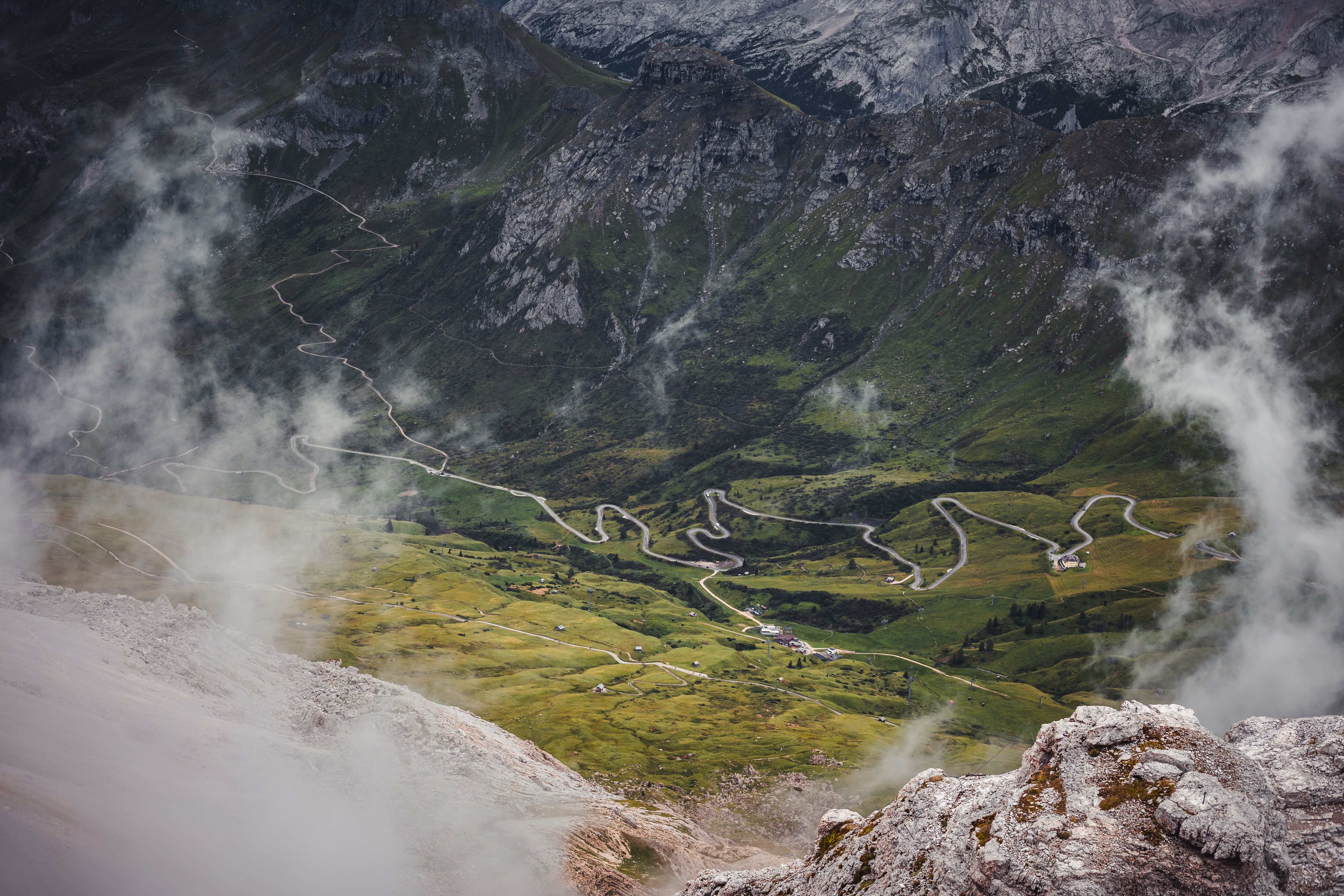 Aerial View of Mountainous Landscape with Winding Road · Free Stock Photo
