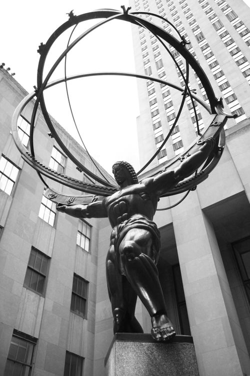 Free Black and white photo of the Atlas Statue at Rockefeller Center, New York City. Stock Photo