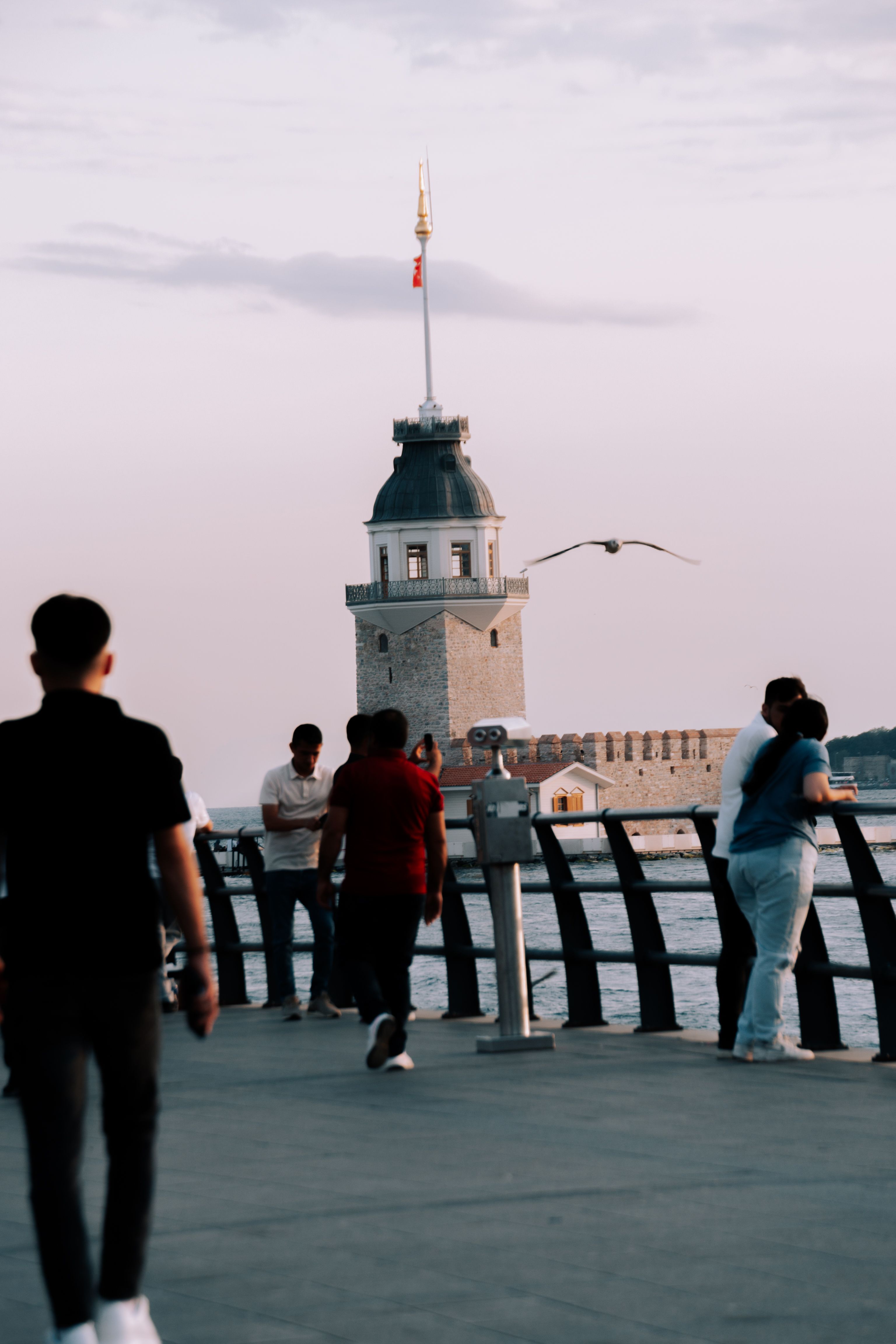 People Strolling Near Maiden's Tower in Istanbul · Free Stock Photo